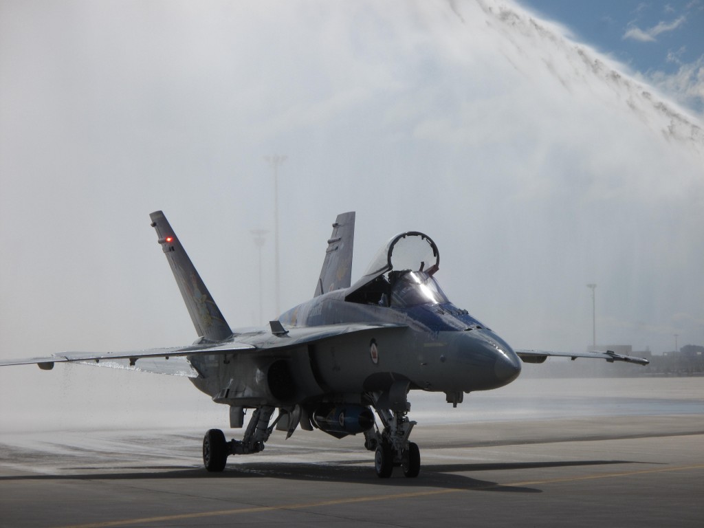 CF18 Hornet Lands with water salute at Pearson Airport